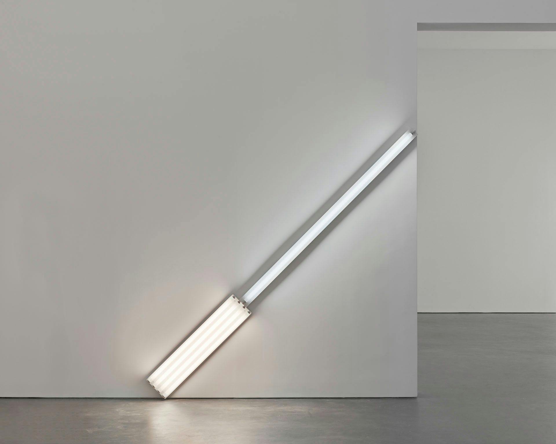 A sculpture in daylight and cool white fluorescent light by Dan Flavin, titled alternate diagonals of March 2, 1964 (to Don Judd), dated 1964.